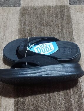 Hey Dude Black Foam Flip Sandals with Blue Insole Logo